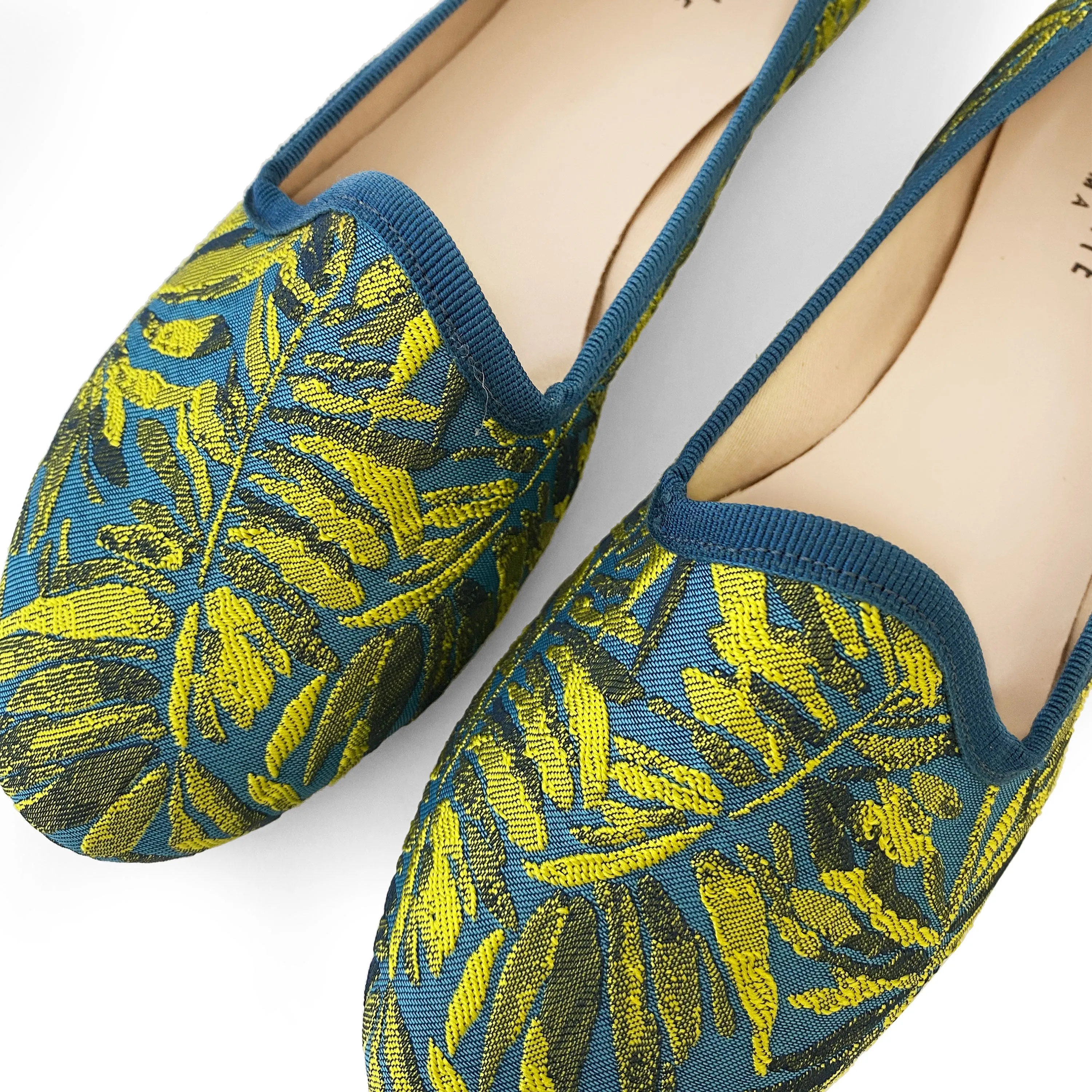 Blue and yellow jacquard loafers with tropical print