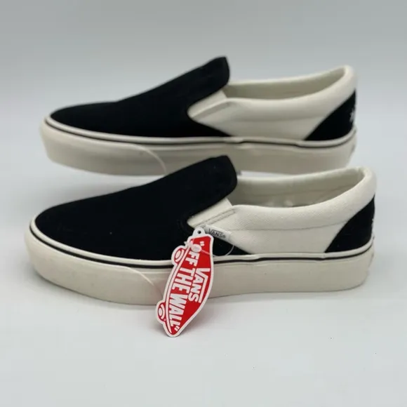 Vans Black and White Slip-On Sneakers