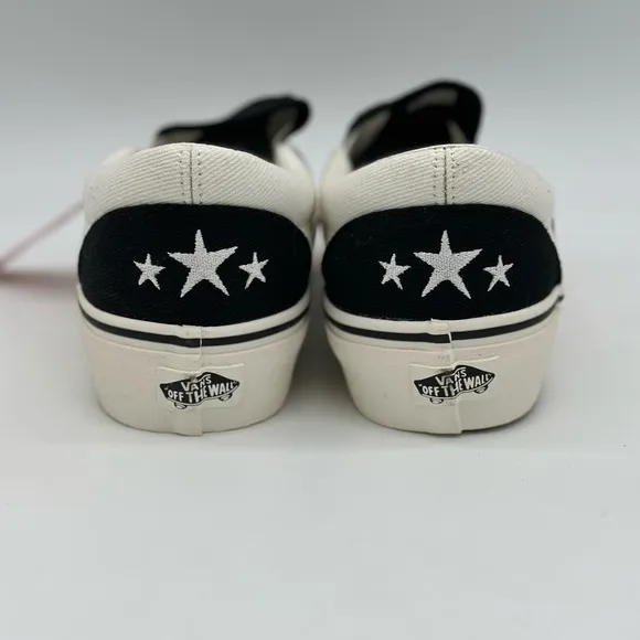 Vans Black and White Slip-On Sneakers