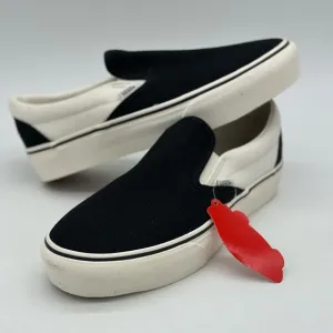 Vans Black and White Slip-On Sneakers
